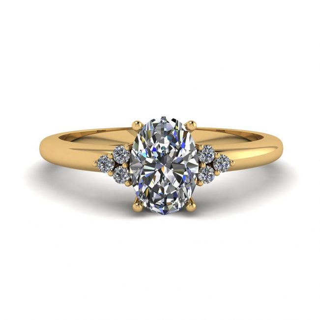 Oval Diamond with 3 Side Diamonds Ring Yellow Gold